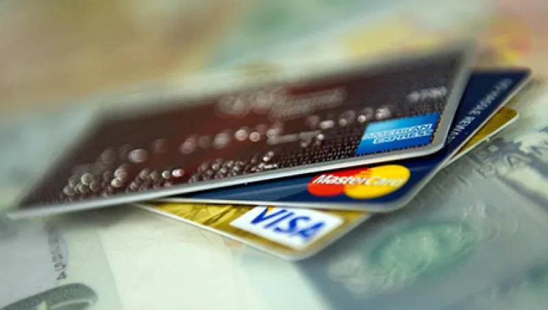 Consumers Use Credit Cards To Buy Necessities As Inflation Crimps Income