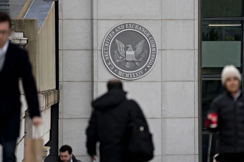 Andrew Harrer/Bloomberg